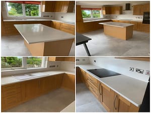 Quartz worktops on this oak kitchen with quality laminate flooring